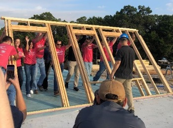 A group of volunteers at Habitat for Humanity. 